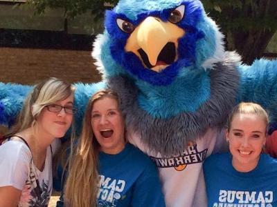 Students pose with Swoop on the quad.